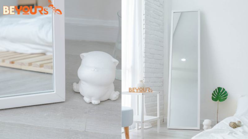 Gương được gắn bên trong cánh tủ quần áo hoặc phía sau cửa phòng ngủ, giúp tối ưu không gian và tránh phản chiếu trực tiếp giường.